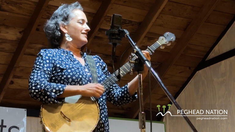 Evie Ladin performs her song "Jump the Fire" at the Great Lakes Music Camp