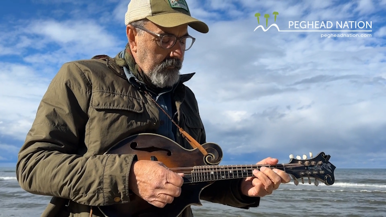 John Reischman plays "The Waves on the Sea" on the shore of Lake Michigan