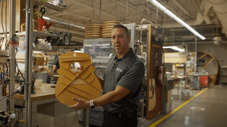 A look at the bracing on a guitar top during a Martin Guitar factory tour